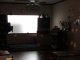 Nous dormions sur le plancher de la salle de karaoke familiale. …